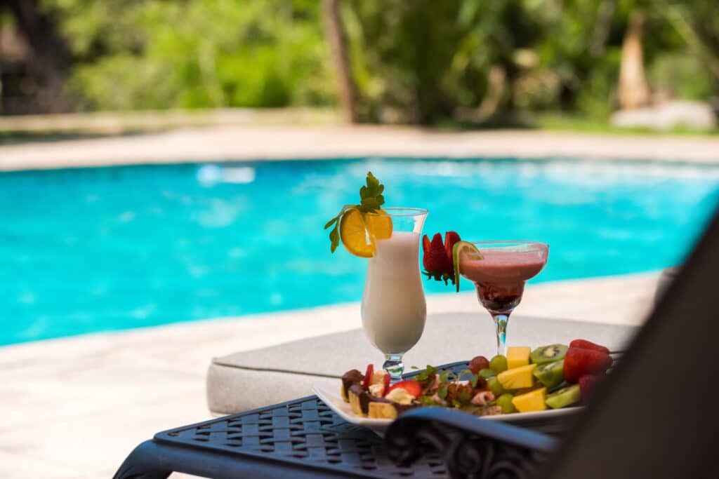 At the heart of the lodge lies a shared pool, providing a perfect spot to reset and refresh between thrilling game drives.